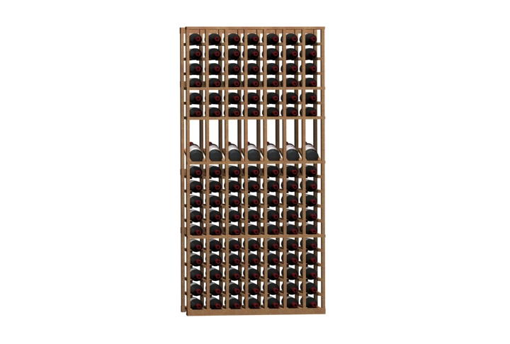 a row of wine bottles in a wooden rack on a white background